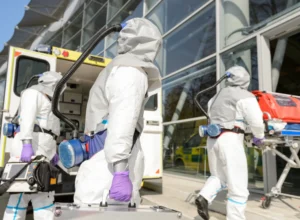 men in suit entering the building for fentanyl removal service